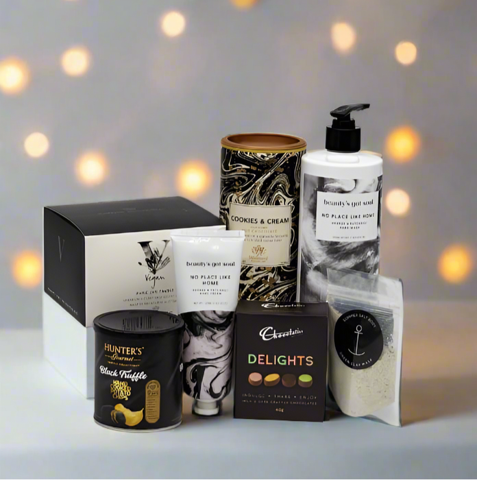 Collection of beauty and lifestyle products on a blurred background with lights